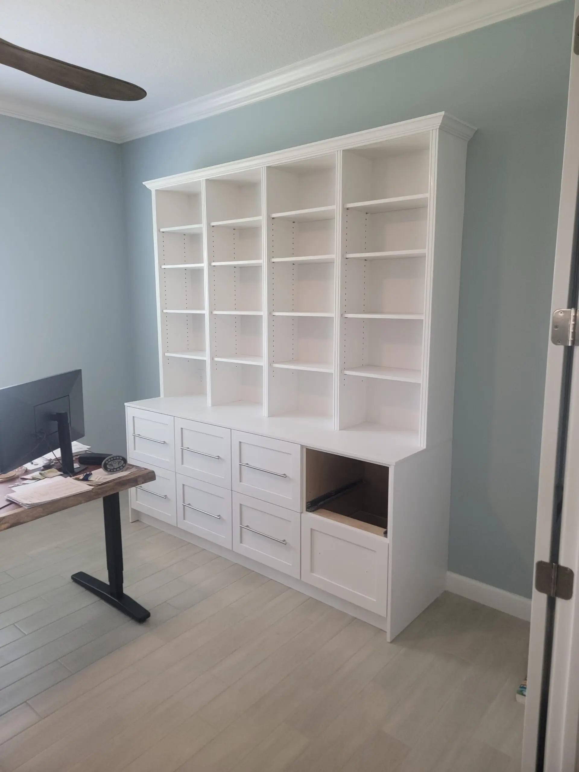 Custom wood office bookshelf built by Rescue Remodeling in Palm Bay FL