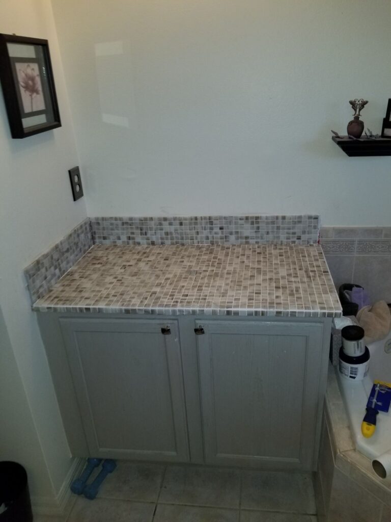 Bathroom vanity with mosaic tile top