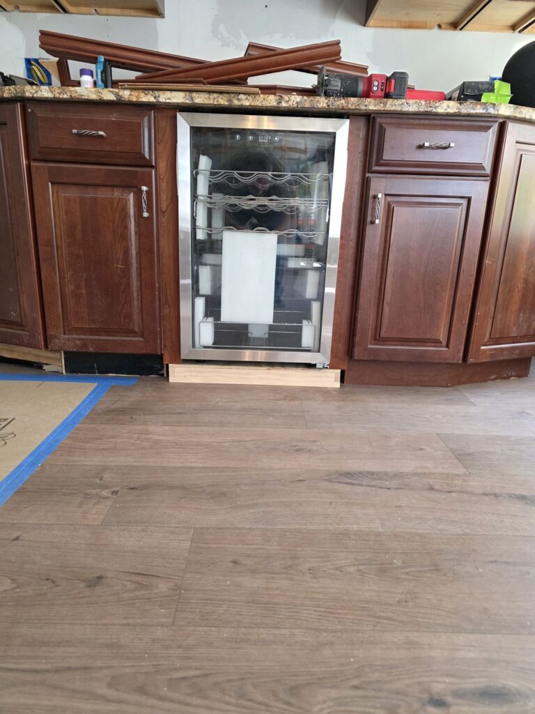 Base cabinets with built-in beverage fridge