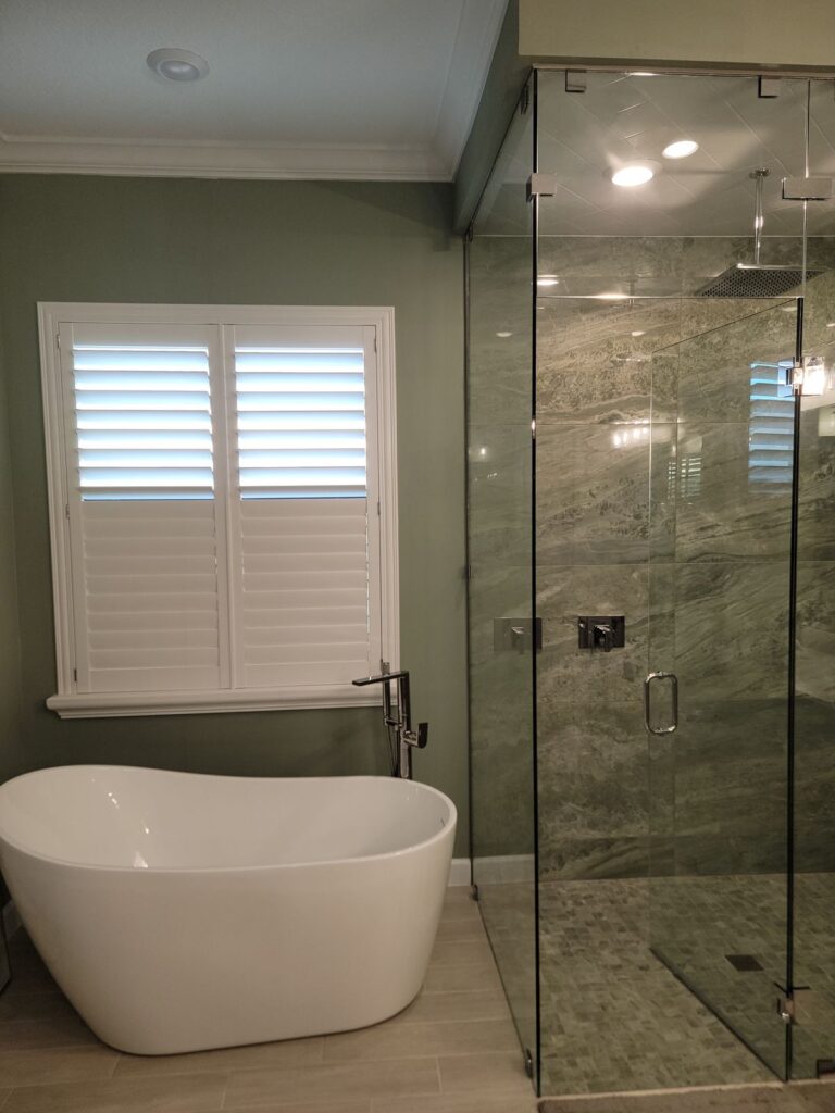 Master bath with freestanding tub and glass walk-in shower
