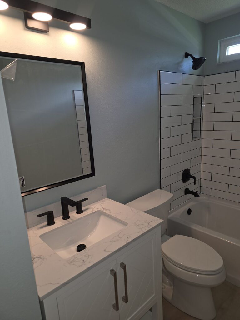 Hall bathroom remodel with new vanity and subway tile