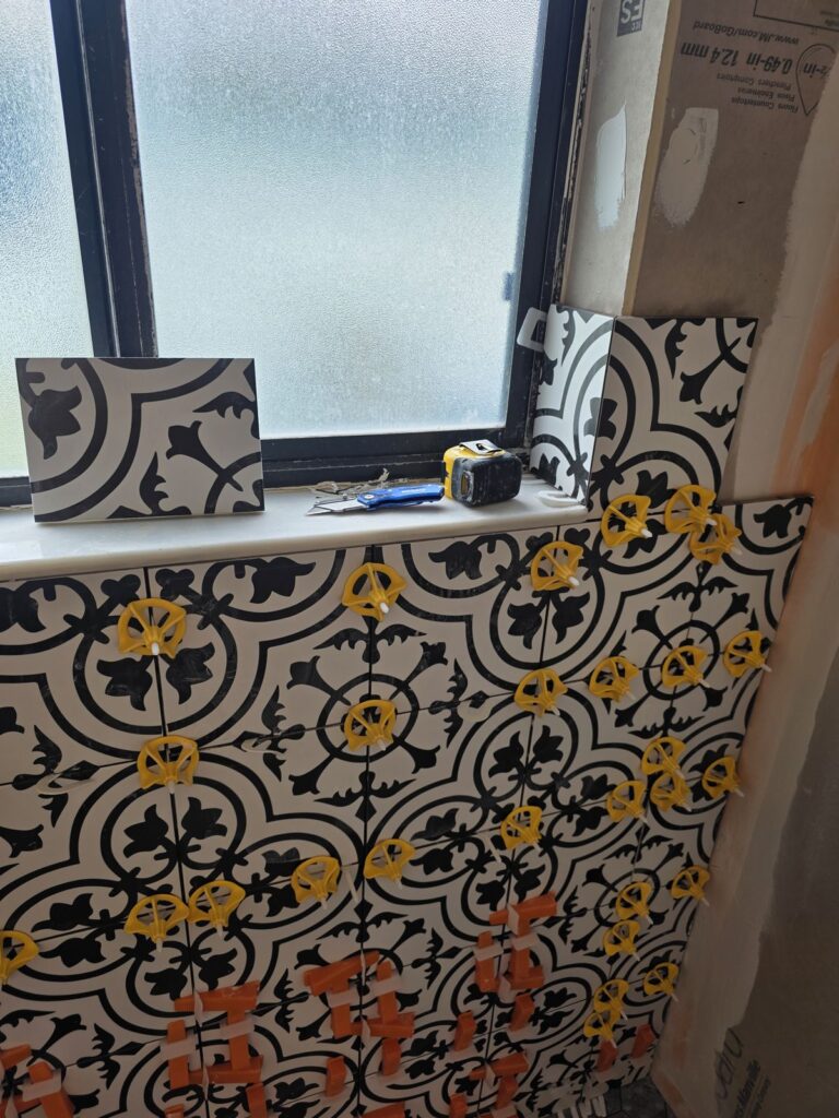 Patterned cement-look tile wainscot