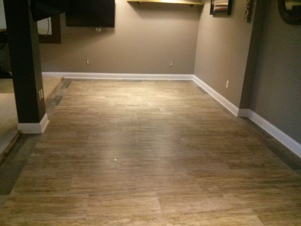 Plank tile floor with baseboard